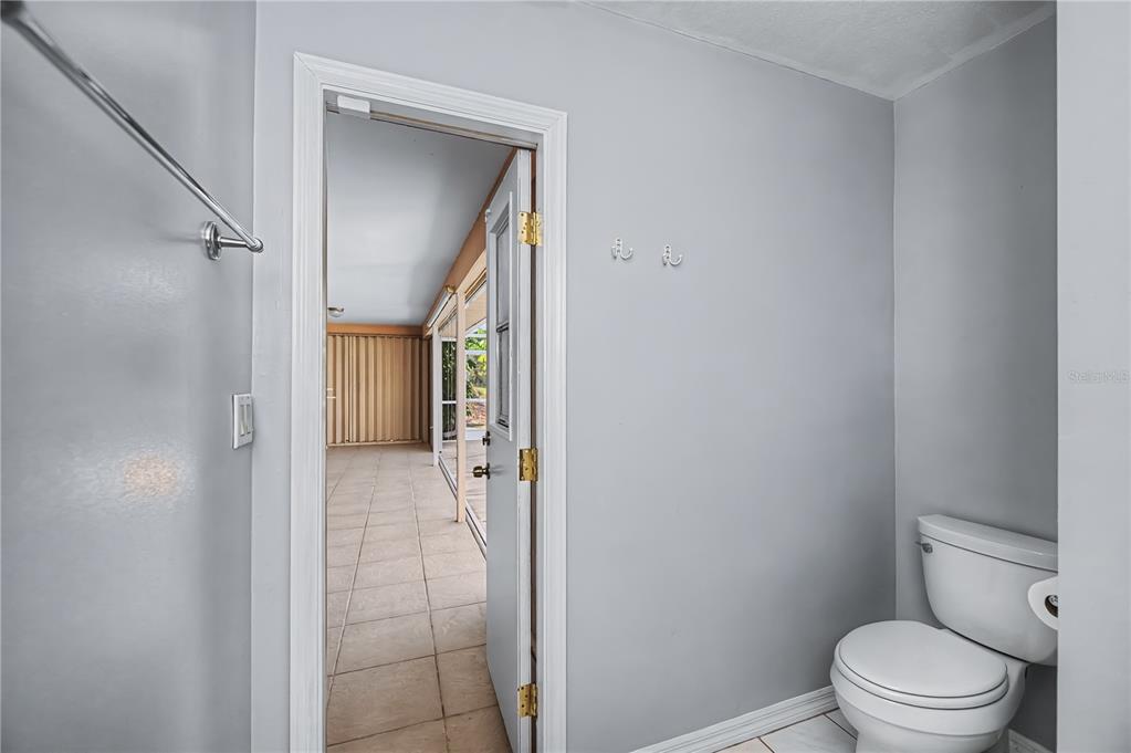 443 Fairmont Terrace Port Charlotte, FL 33954 - Photo 50 of 77 a bathroom with a granite countertop toilet and sink