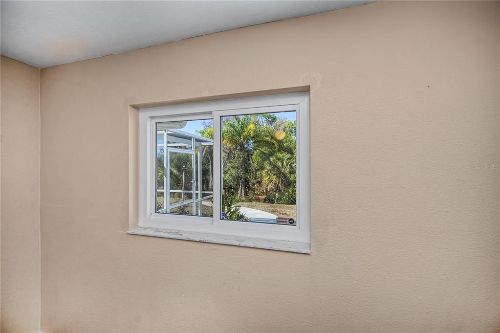 443 Fairmont Terrace Port Charlotte, FL 33954 - Photo 52 of 77 a view of an empty room with a window