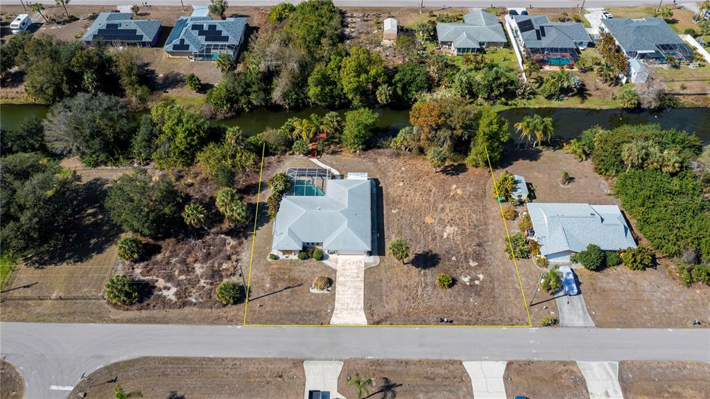 443 Fairmont Terrace Port Charlotte, FL 33954 - Photo 6 of 77 aerial view of a house with a lake view