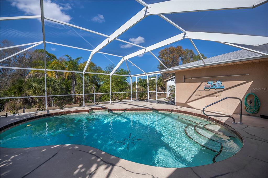 443 Fairmont Terrace Port Charlotte, FL 33954 - Photo 62 of 77 a view of a backyard with sitting area