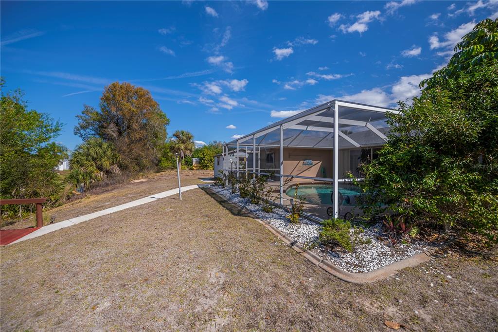 443 Fairmont Terrace Port Charlotte, FL 33954 - Photo 67 of 77 a view of a backyard