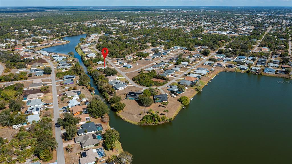 443 Fairmont Terrace Port Charlotte, FL 33954 - Photo 9 of 77 an aerial view of a house with a ocean view