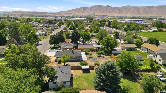 546 West 200 South Payson, UT 84651 - Photo 37 of 45 Aerial perspective showcasing a residential area with varied rooflines and extensive tree canopy