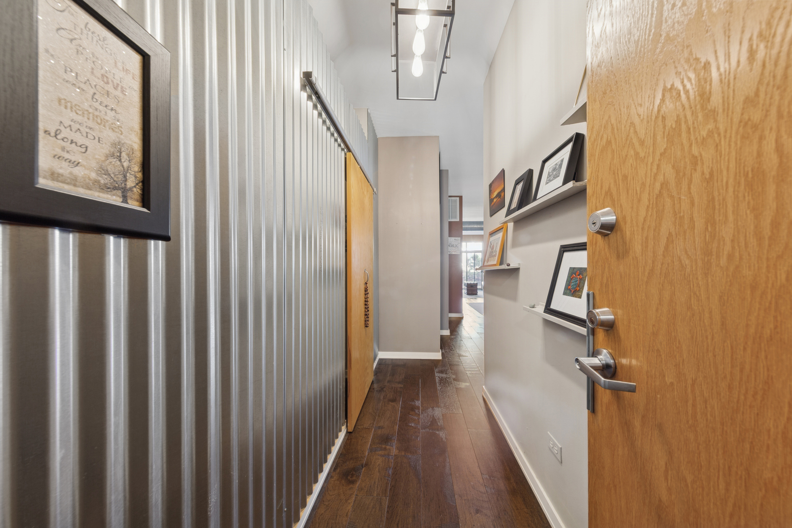 1631 South Michigan Avenue, Unit 410 Chicago, IL 60616 - Photo 12 of 20 a view of a hallway with wooden floor and staircase