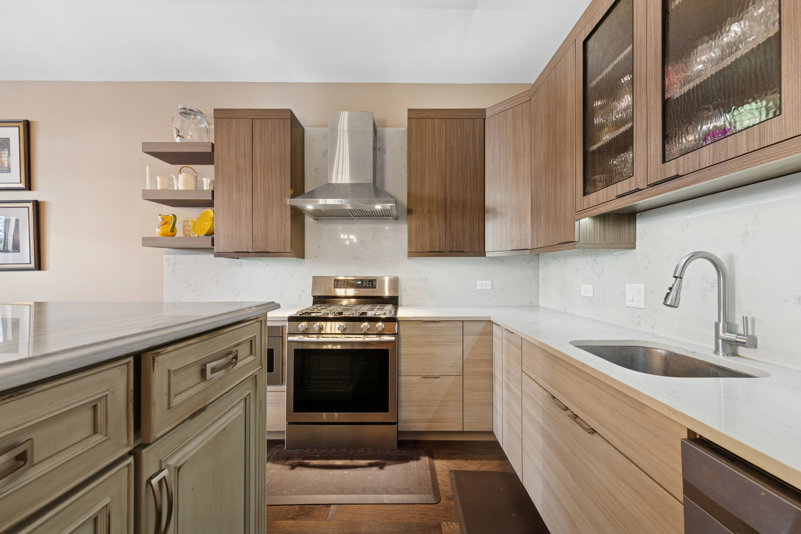 1631 South Michigan Avenue, Unit 410 Chicago, IL 60616 - Photo 10 of 20 a kitchen with stainless steel appliances granite countertop a stove and a sink