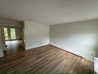 95 Court Street Bath, ME 04530 - Photo 6 of 26 Side view of front room