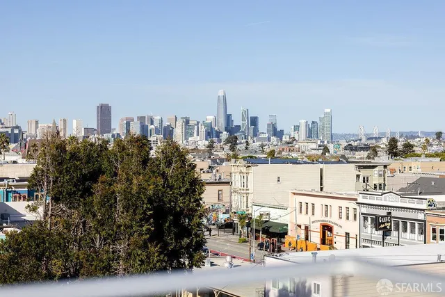 a view of a city with tall buildings