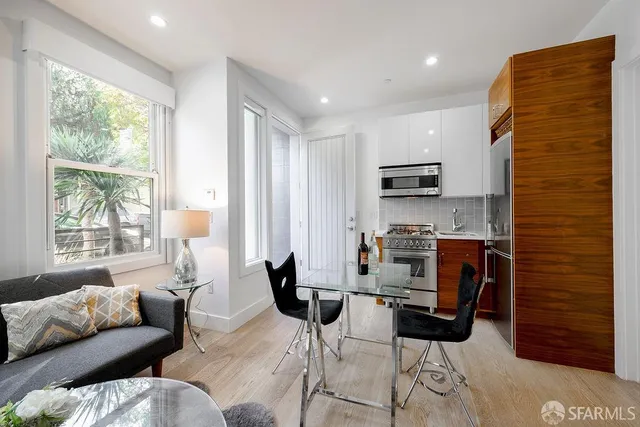 a workspace with furniture and a window