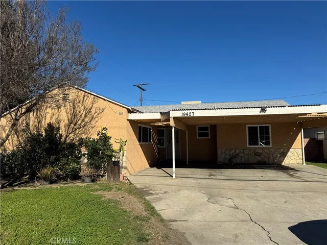 a view of a house with a patio