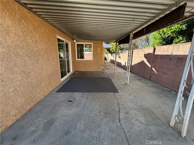 a view of a back yard of the house