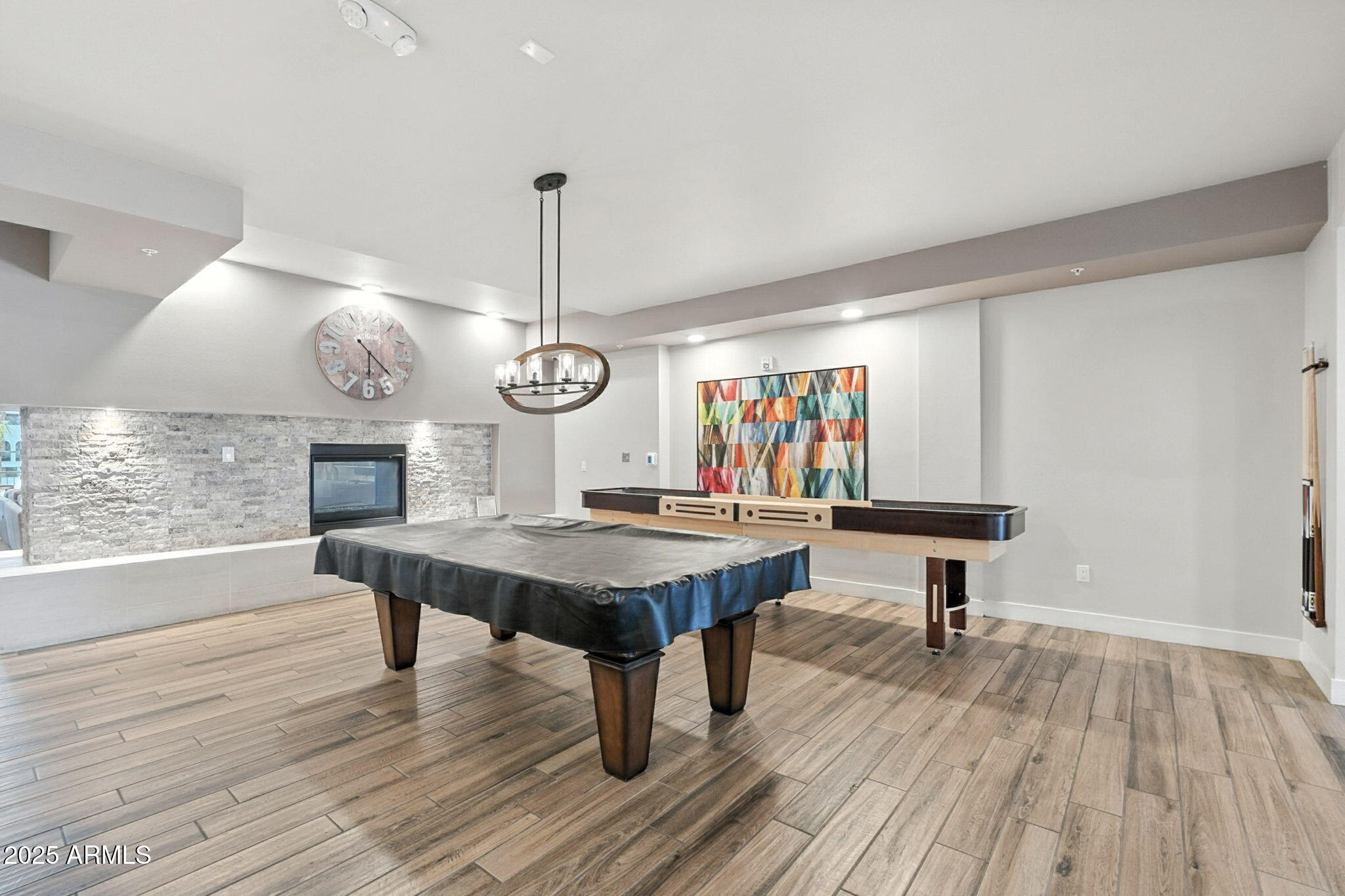 2511 West Queen Creek Road, Unit 205 Chandler, AZ 85248 - Photo 25 of 50 Pool Table & Fireplace in Clubhouse