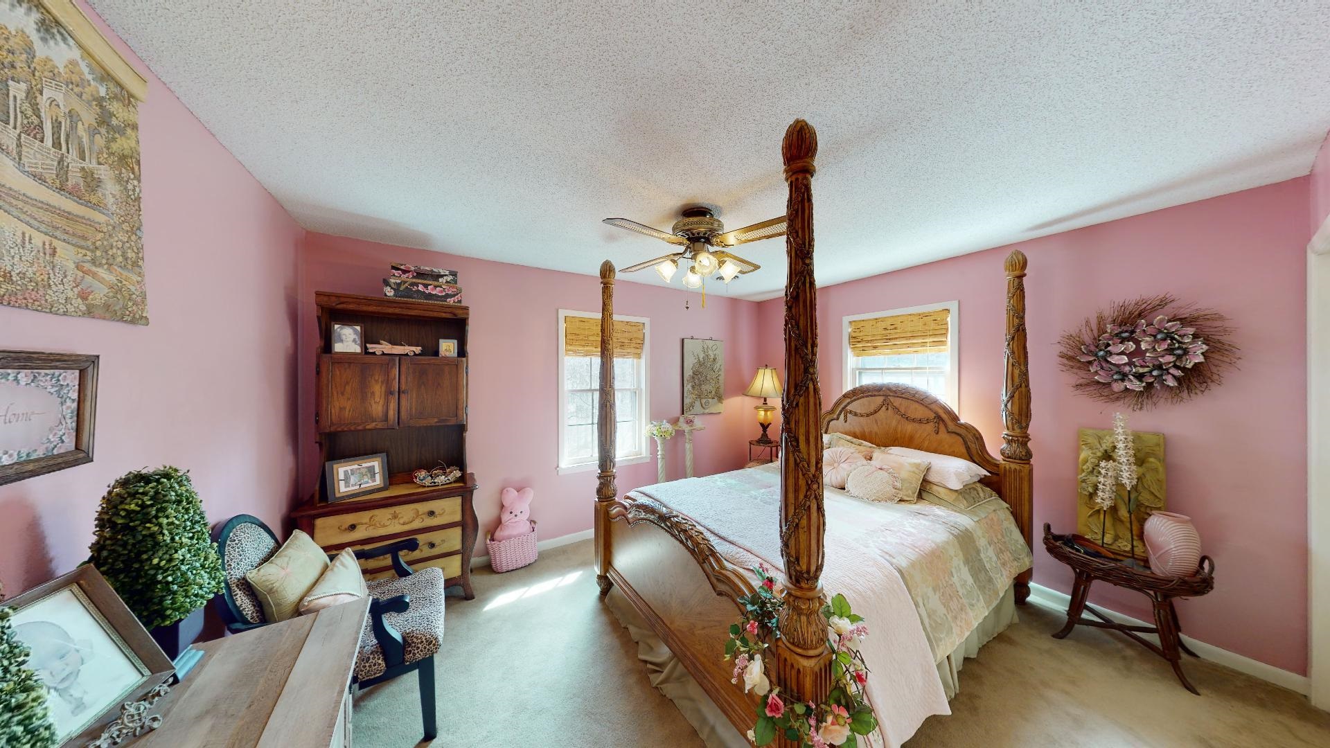 3445 Highway 142 Counce, TN 38326 - Photo 14 of 25 a bed room with furniture and a chandelier