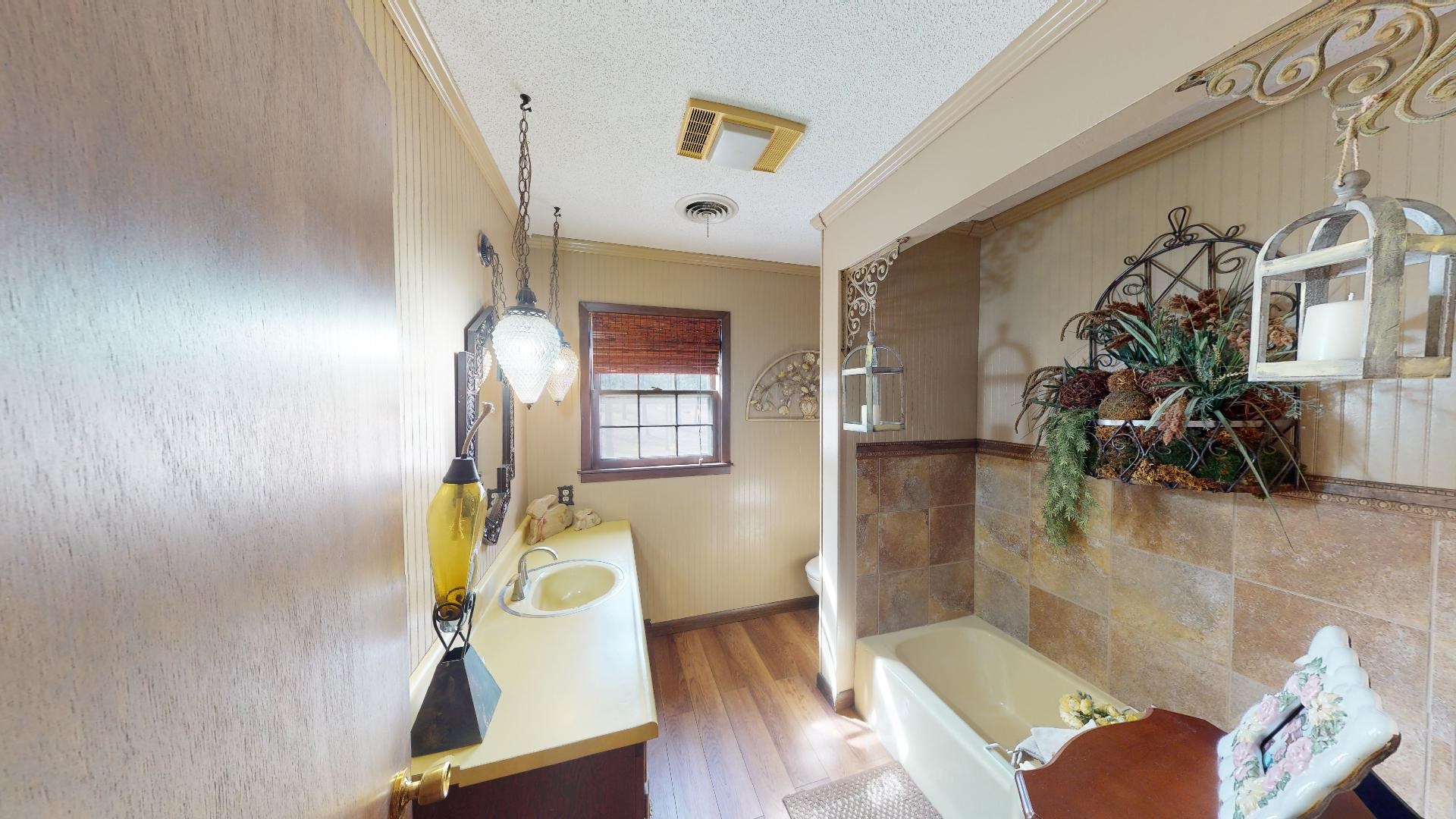 3445 Highway 142 Counce, TN 38326 - Photo 16 of 25 a bathroom with a tub