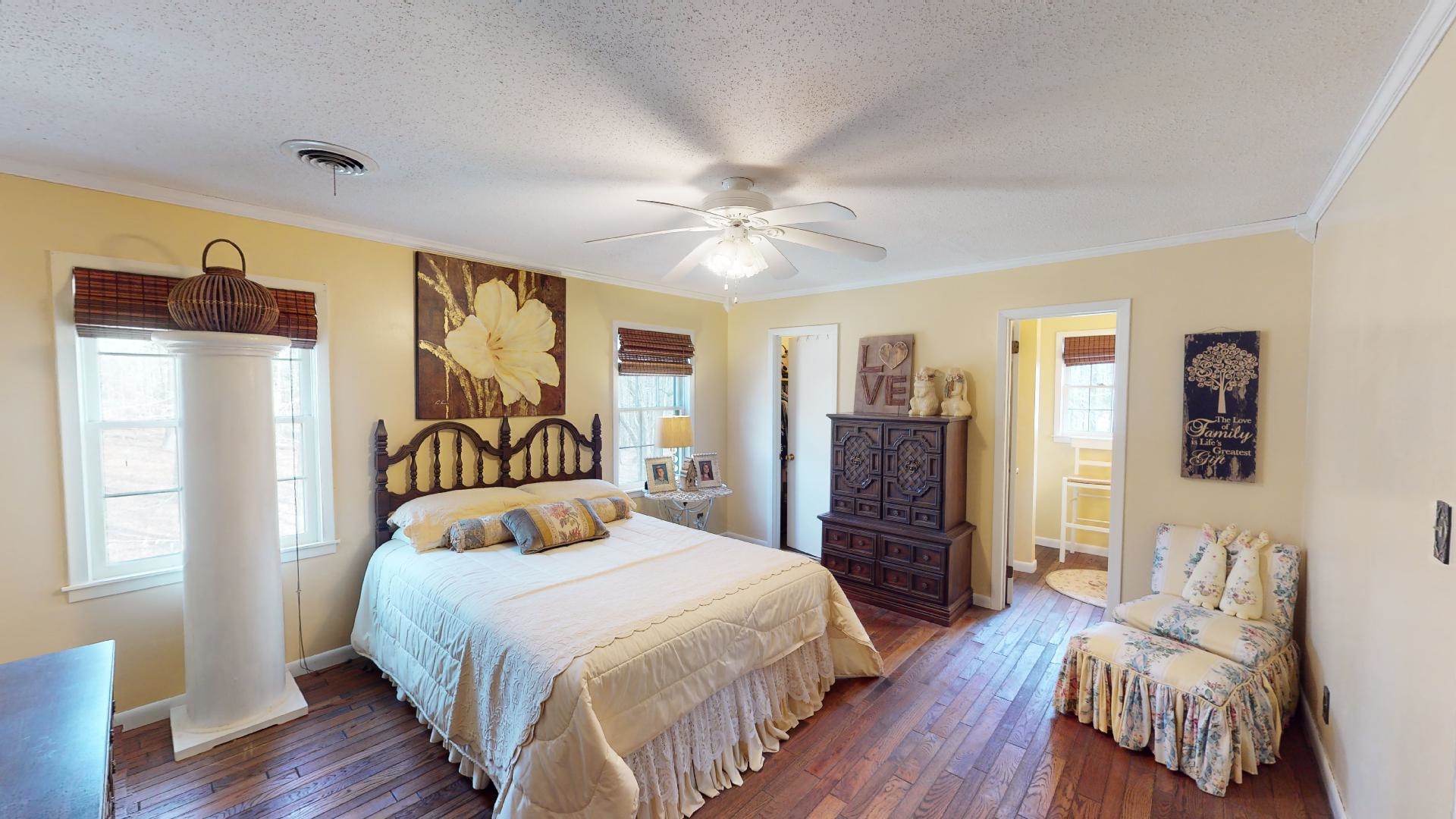 3445 Highway 142 Counce, TN 38326 - Photo 17 of 25 a bedroom with a bed and wooden floor