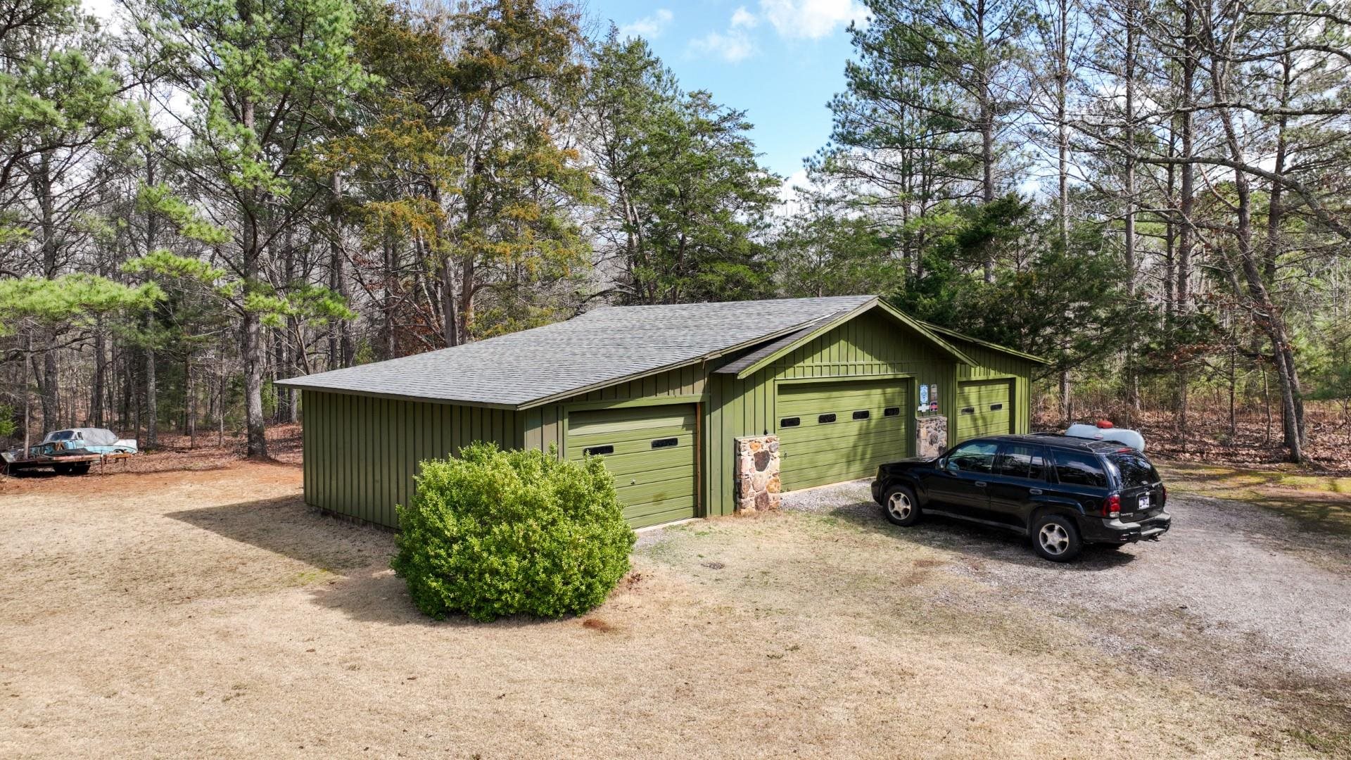 3445 Highway 142 Counce, TN 38326 - Photo 2 of 25 a front view of a house with garden