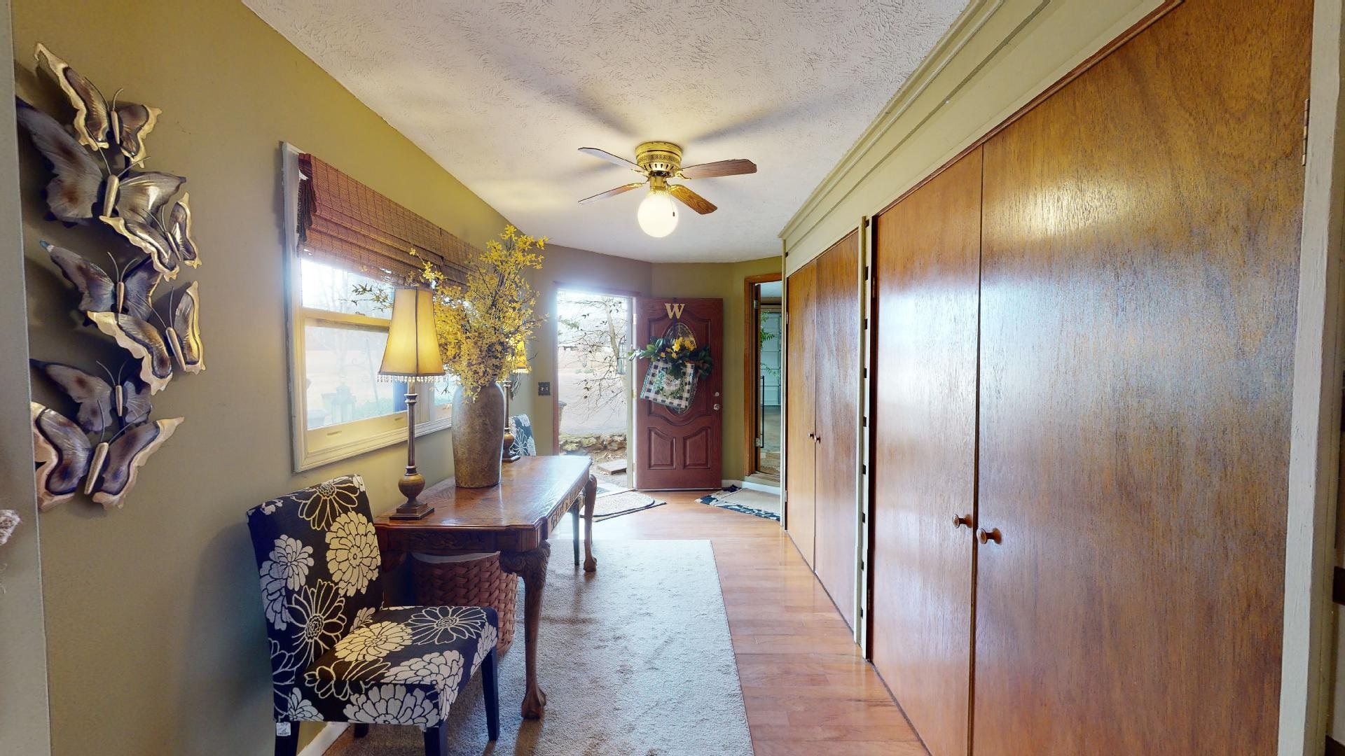3445 Highway 142 Counce, TN 38326 - Photo 21 of 25 a view of a hallway with furniture and a chandelier
