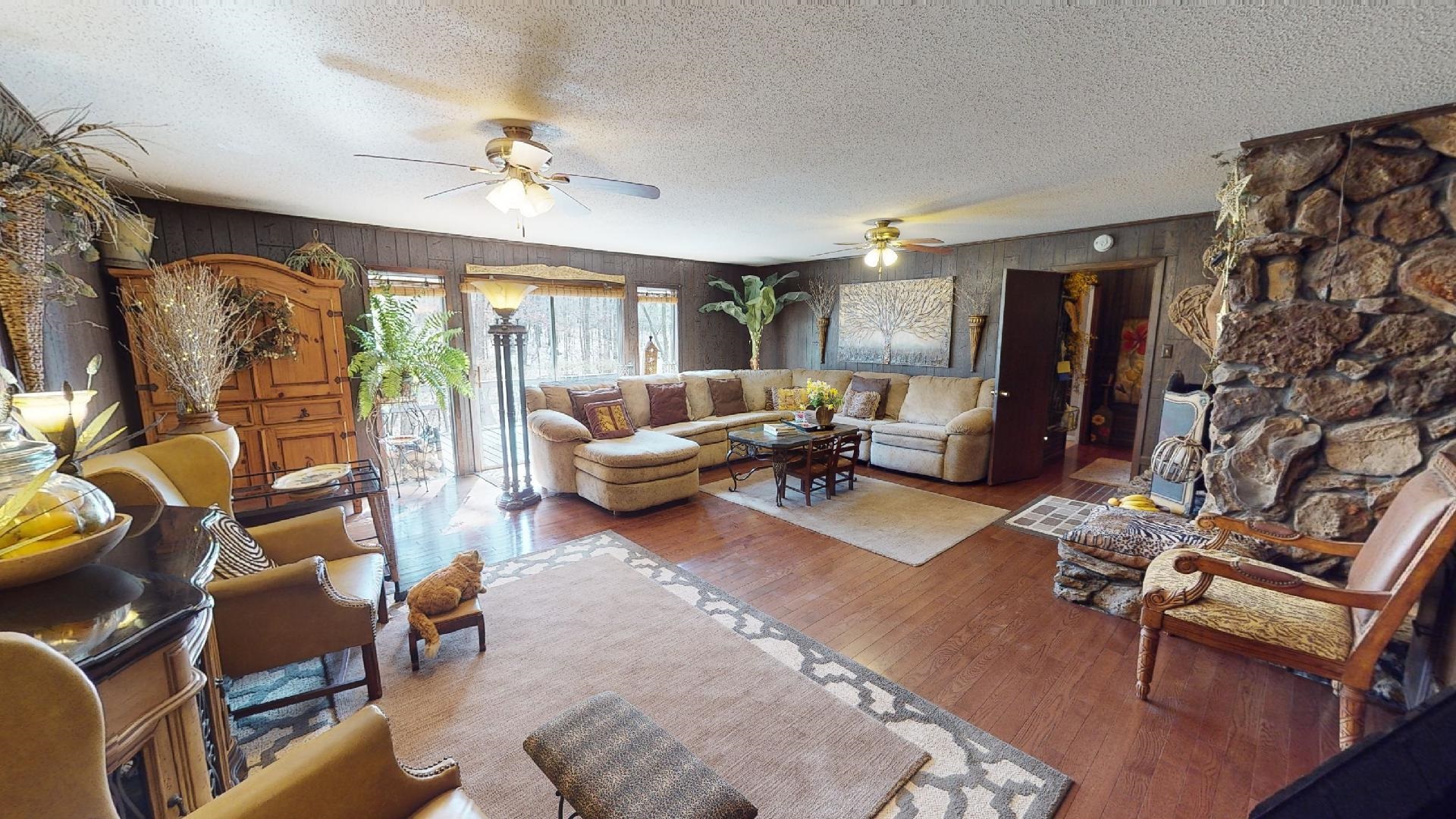 3445 Highway 142 Counce, TN 38326 - Photo 4 of 25 a living room with furniture and a chandelier
