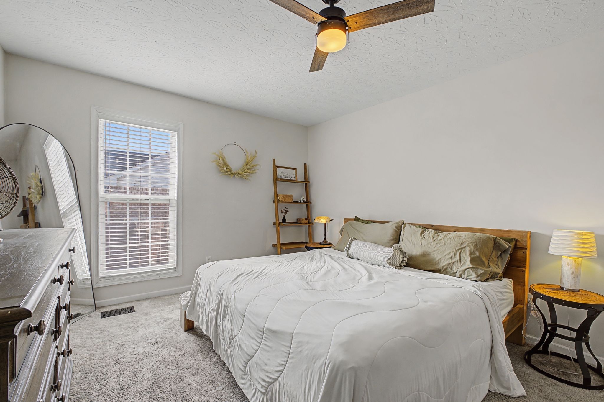 160 Putter Point Drive Gallatin, TN 37066 - Photo 20 of 35 a bedroom with a bed and a window