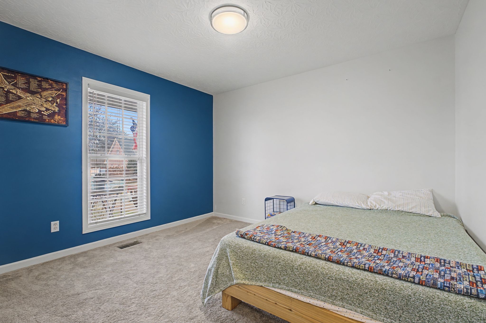 160 Putter Point Drive Gallatin, TN 37066 - Photo 24 of 35 a bedroom with a bed and a window