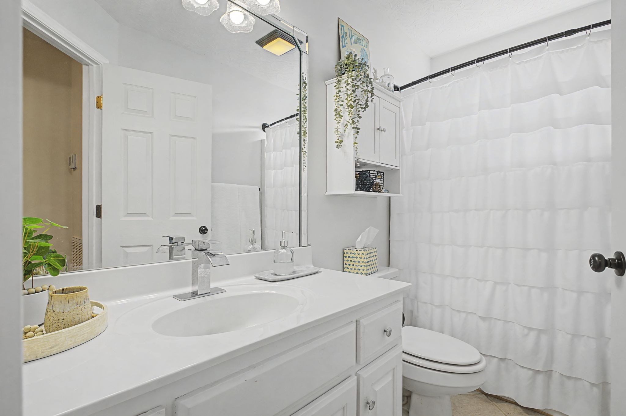 160 Putter Point Drive Gallatin, TN 37066 - Photo 28 of 35 a bathroom with a sink and a mirror