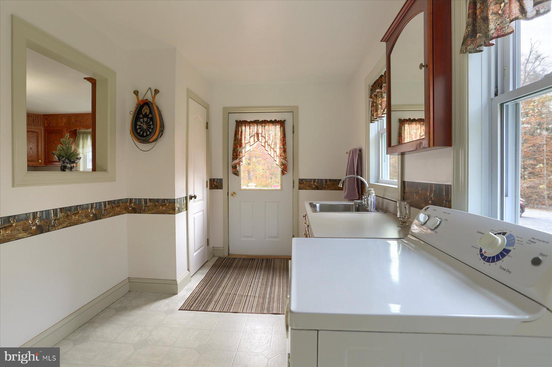 7504 Raccoon Valley Road Millerstown, PA 17062 - Photo 16 of 71 a view of a living room and a window