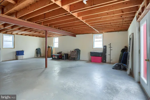 a view of an empty room with cabinet