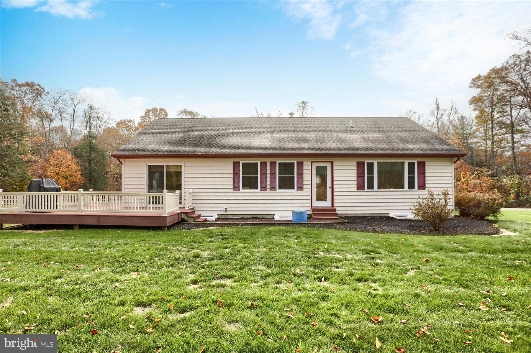 7504 Raccoon Valley Road Millerstown, PA 17062 - Photo 43 of 71 a house that has a big yard with wooden fence