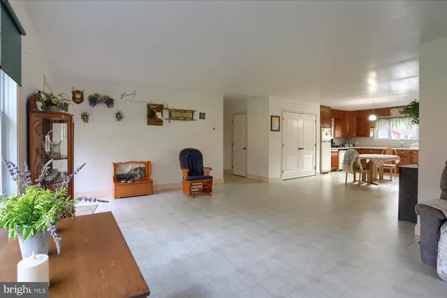 a view of livingroom with furniture and a flat screen tv