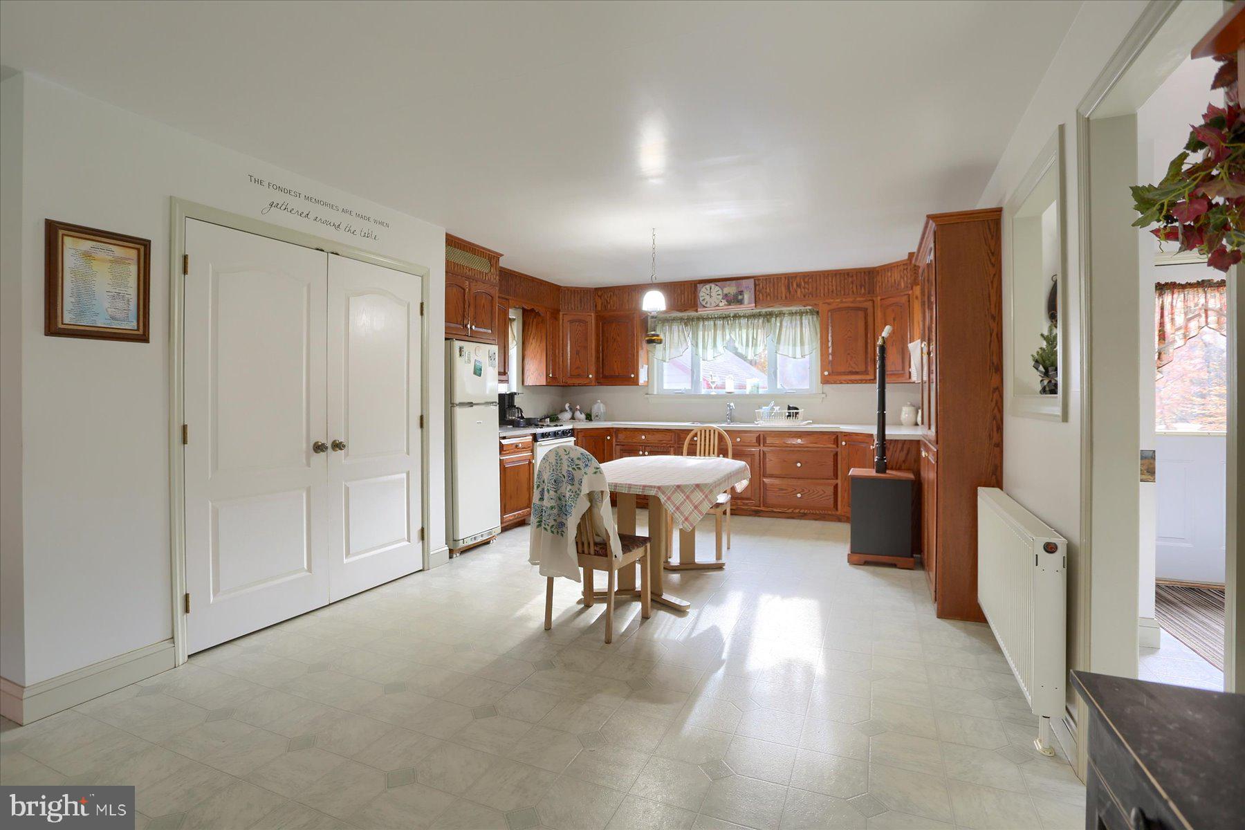 7504 Raccoon Valley Road Millerstown, PA 17062 - Photo 8 of 71 a living room with furniture and a large window