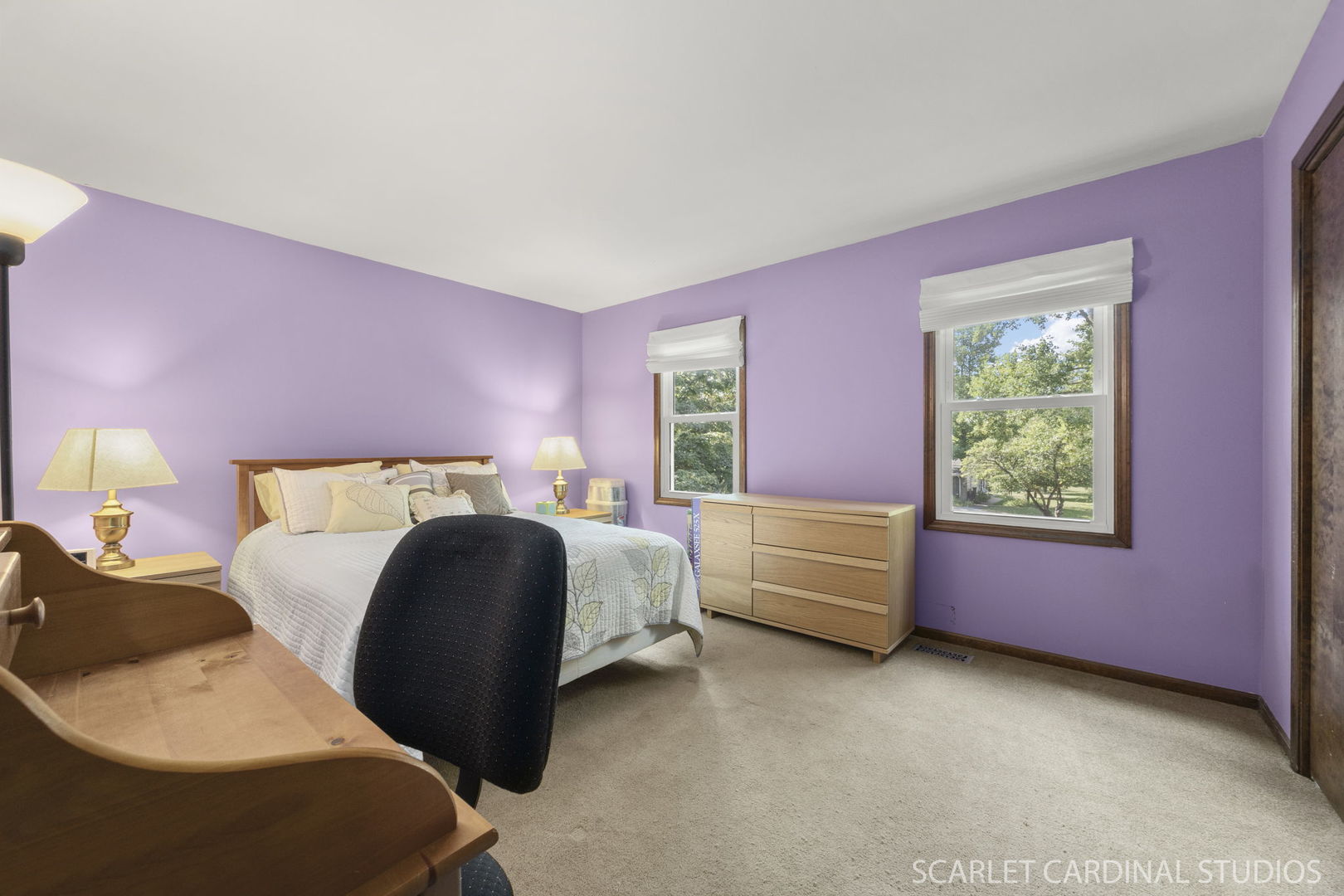 4705 Elm Street Lisle, IL 60532 - Photo 15 of 21 a bedroom with a bed and a window