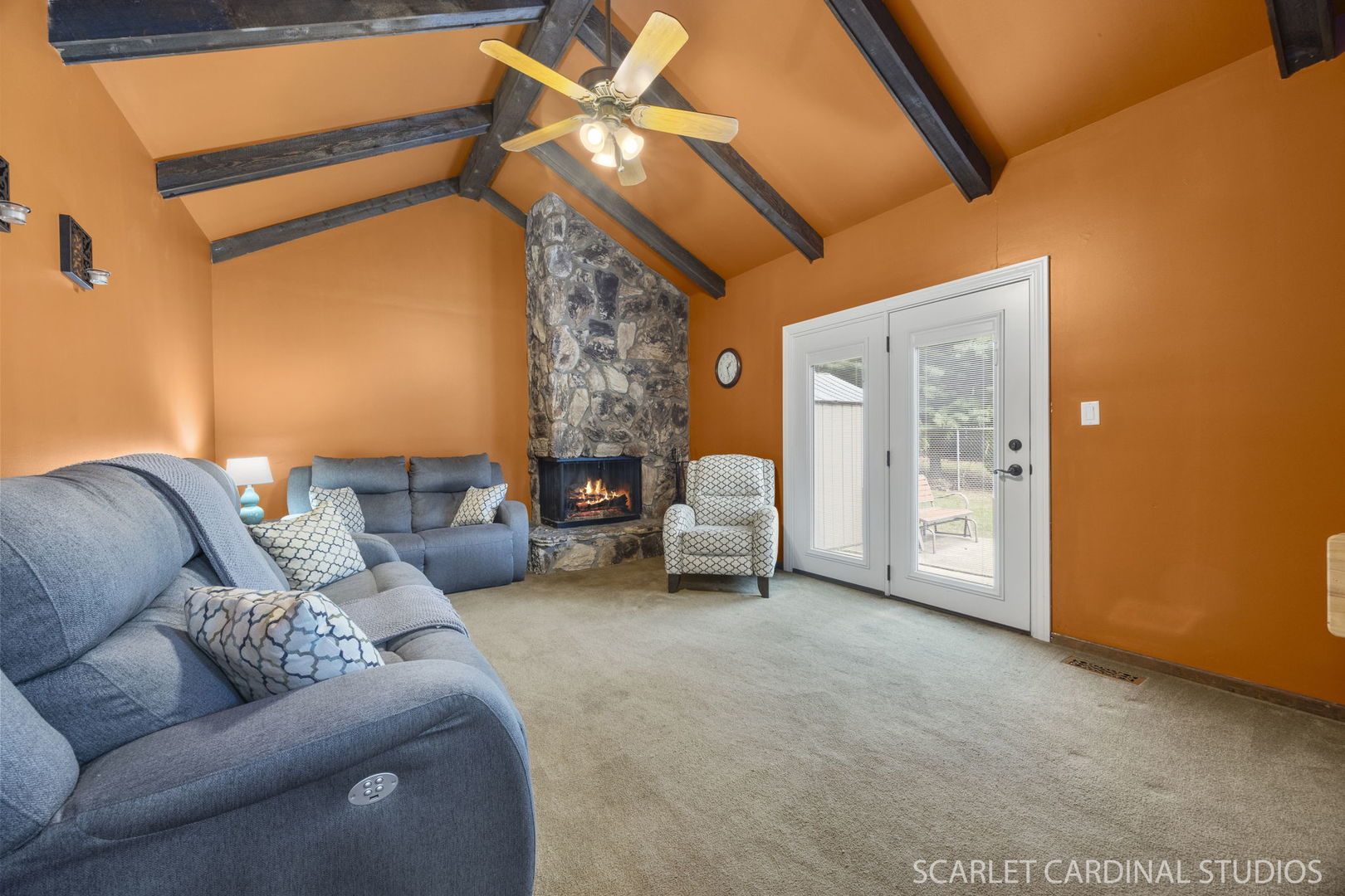 4705 Elm Street Lisle, IL 60532 - Photo 10 of 21 a living room with furniture and a chandelier
