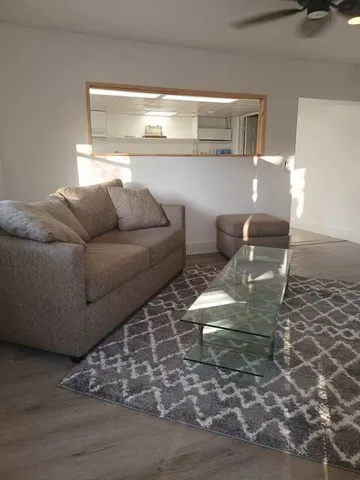 a kitchen with a faucet a stove and cabinets