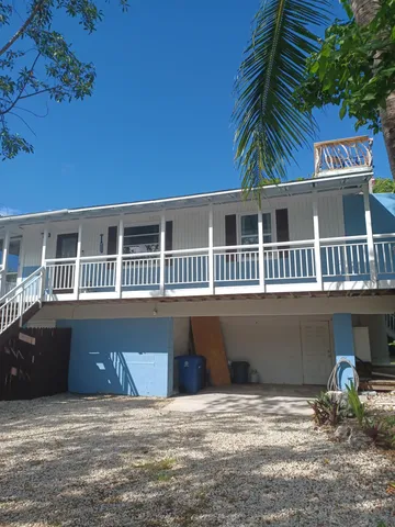 a front view of a house with a balcony