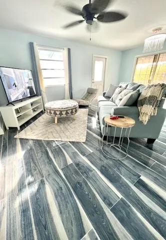 a room with a closet and wooden floor