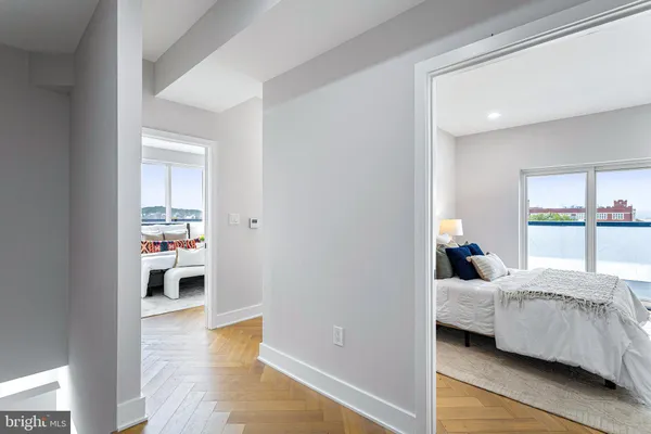 a bedroom with a bed and a view of bedroom