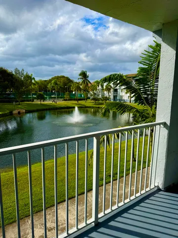 a view of a lake from a balcony