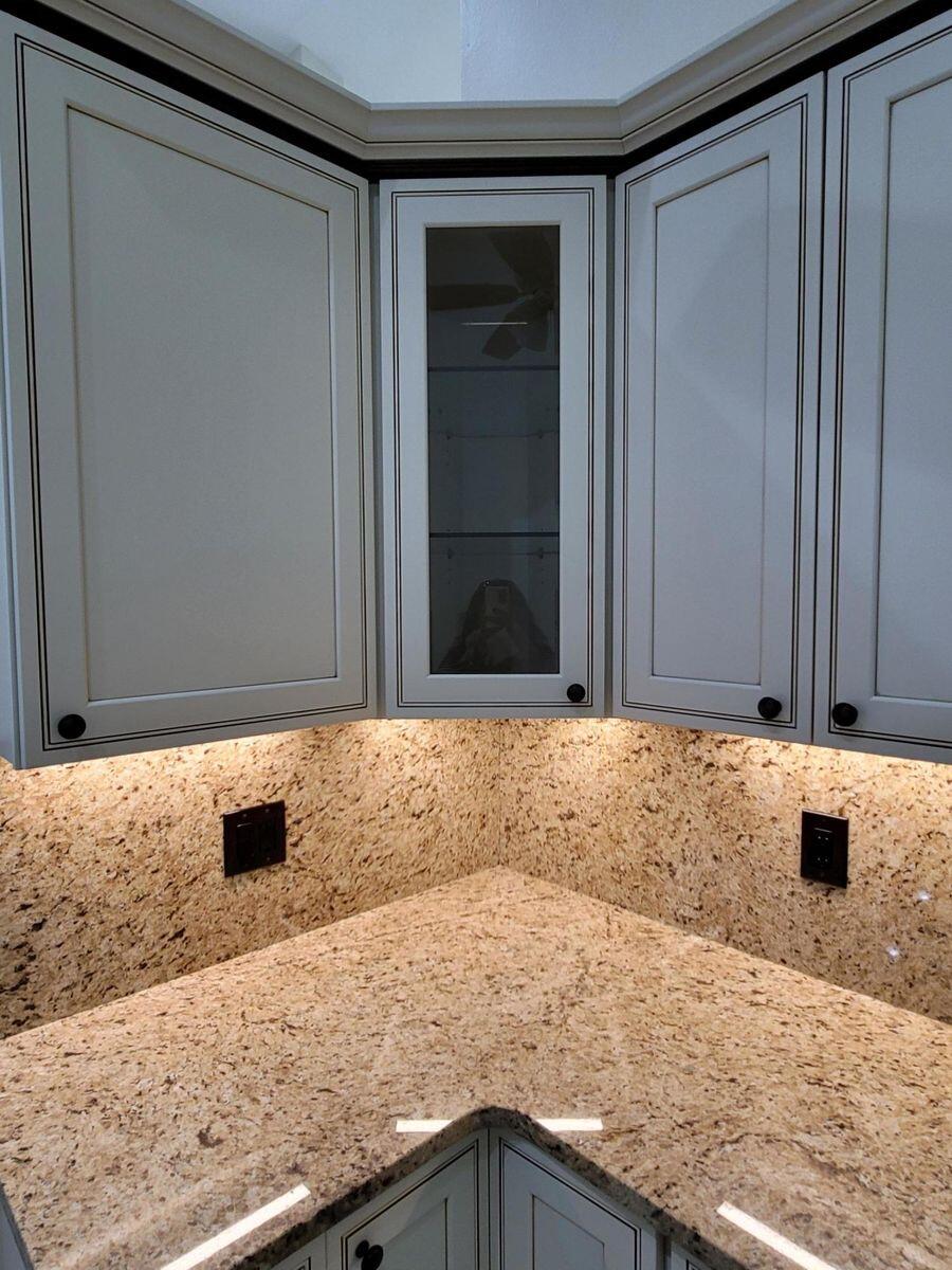 11000 Ladera Lane, Unit B Boca Raton, FL 33498 - Photo 16 of 29 a kitchen with a sink and a granite counter top