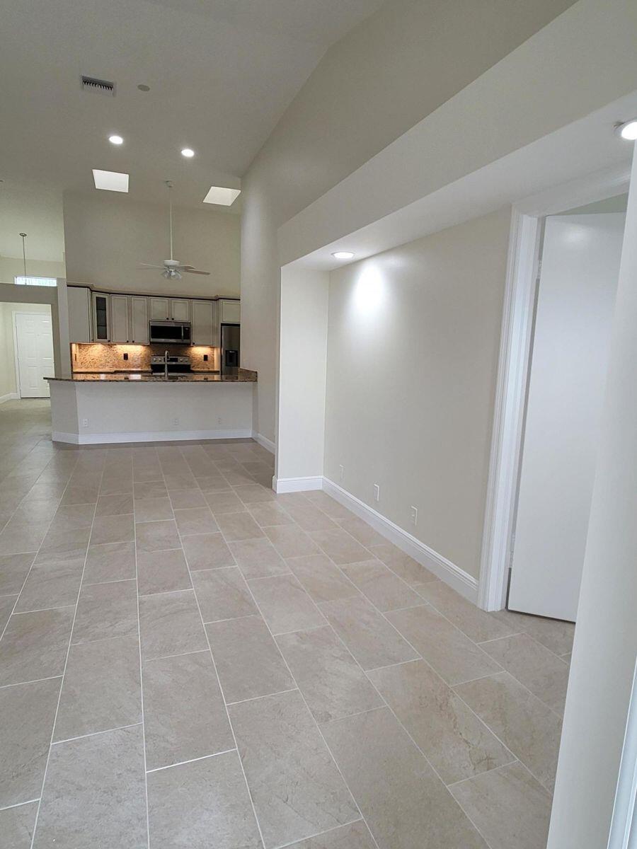 11000 Ladera Lane, Unit B Boca Raton, FL 33498 - Photo 17 of 29 a view of a car garage