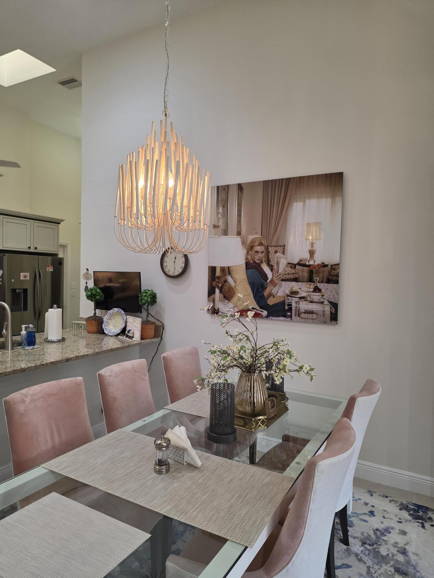 11000 Ladera Lane, Unit B Boca Raton, FL 33498 - Photo 6 of 29 a dining room with furniture and window