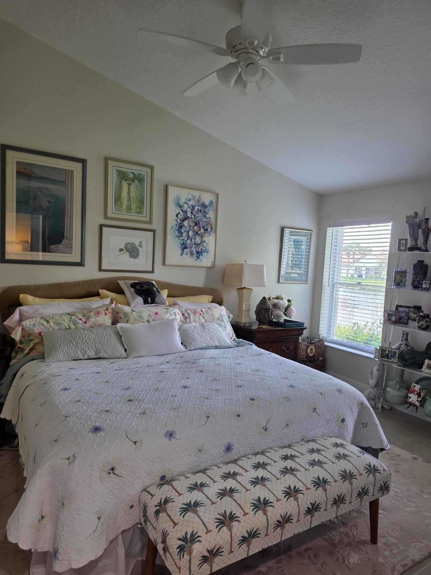 11000 Ladera Lane, Unit B Boca Raton, FL 33498 - Photo 7 of 29 a bedroom with a bed and a window