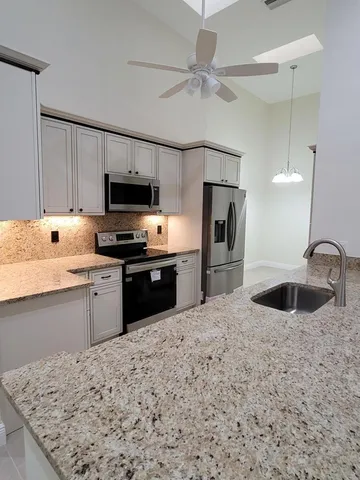 a bedroom with furniture and baby walls