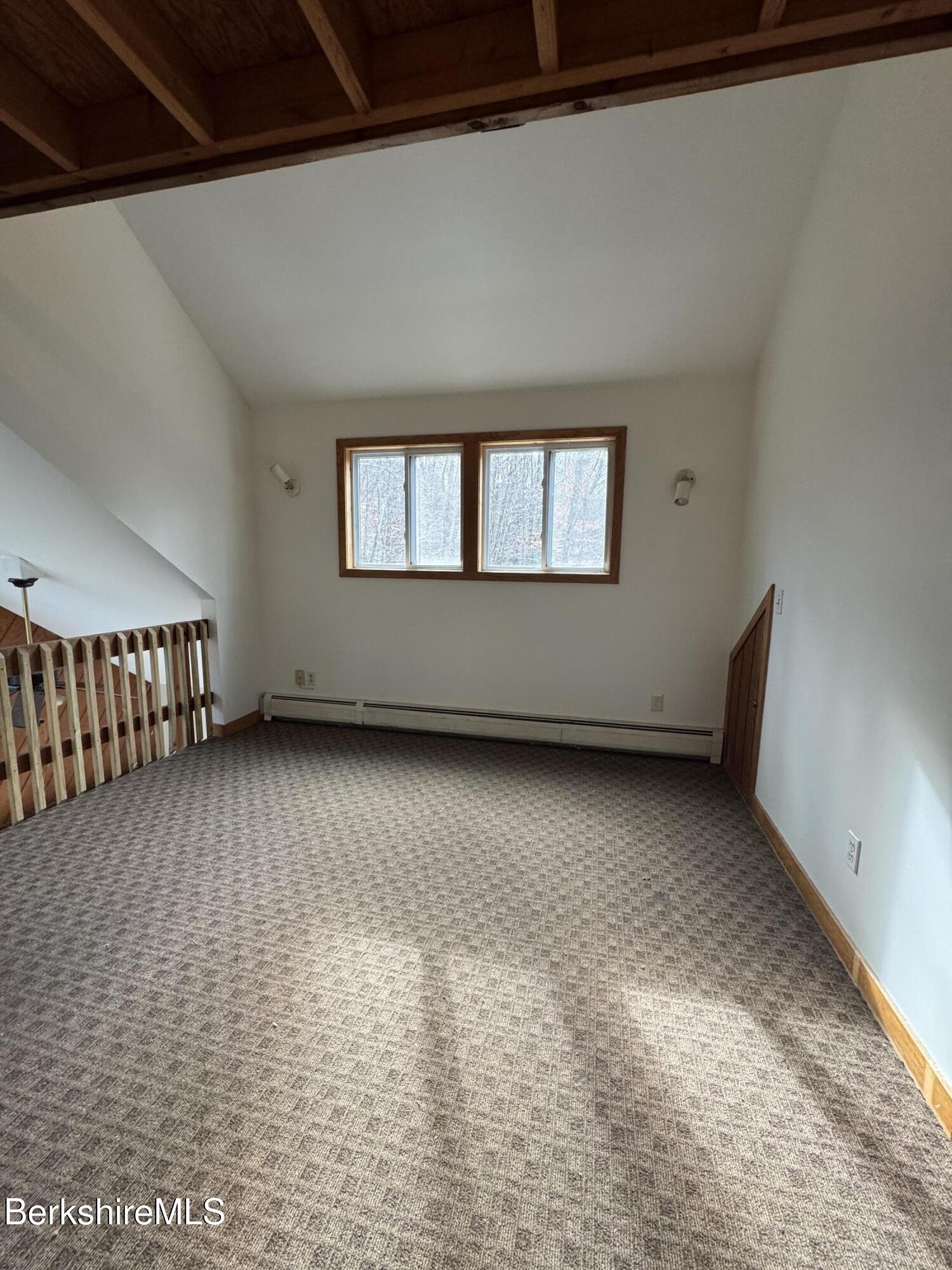 271 Brodie Mountain Road Hancock, MA 01237 - Photo 13 of 27 a view of an empty room with windows
