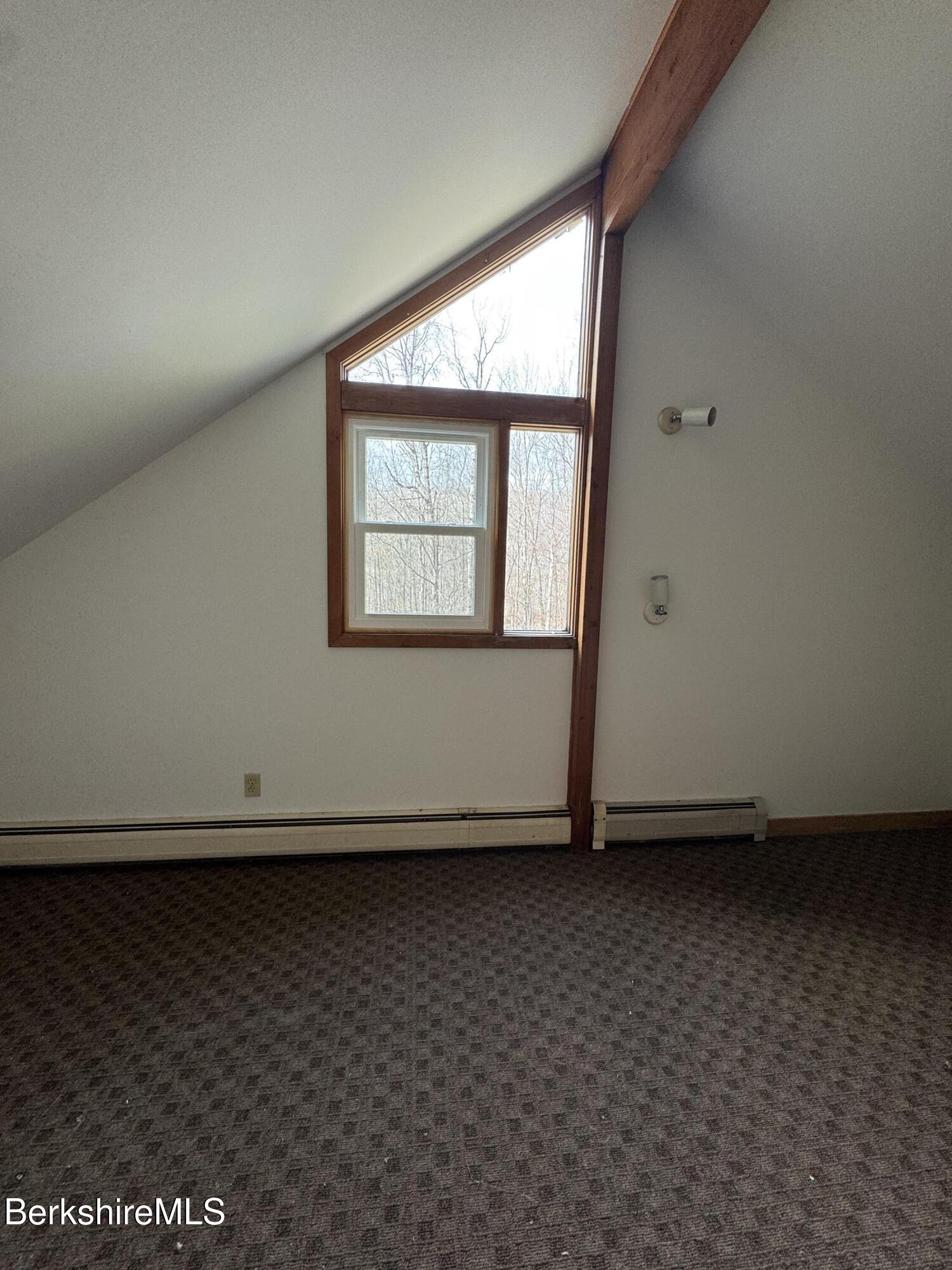 271 Brodie Mountain Road Hancock, MA 01237 - Photo 14 of 27 an empty room with a window