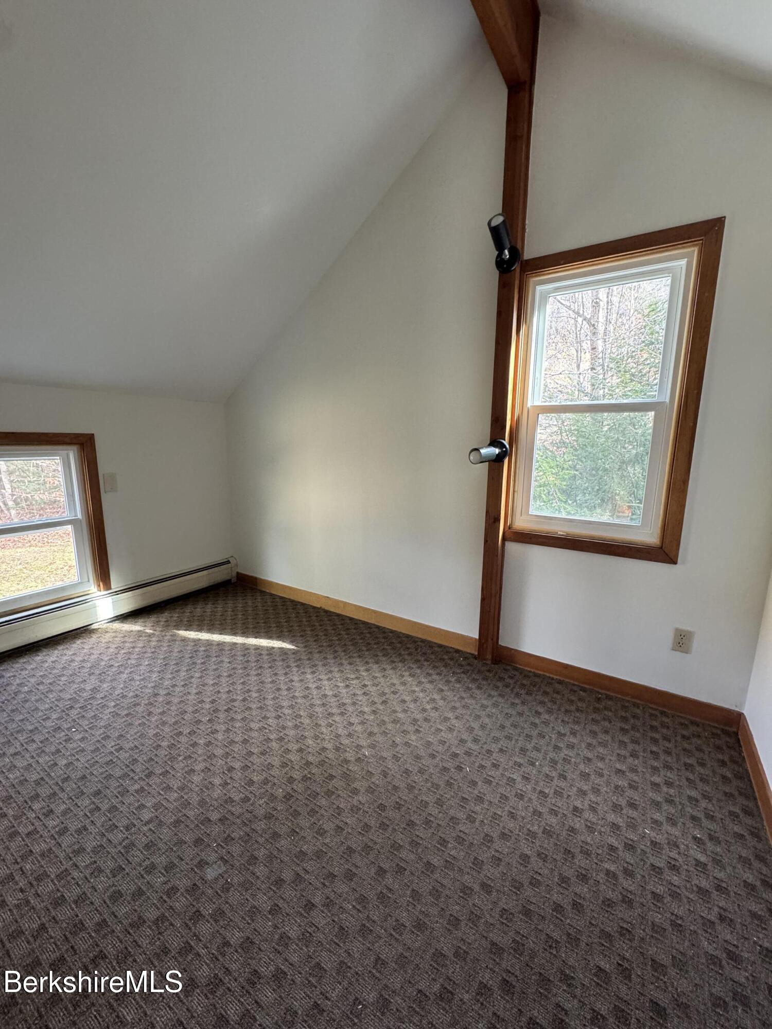 271 Brodie Mountain Road Hancock, MA 01237 - Photo 16 of 27 an empty room with windows