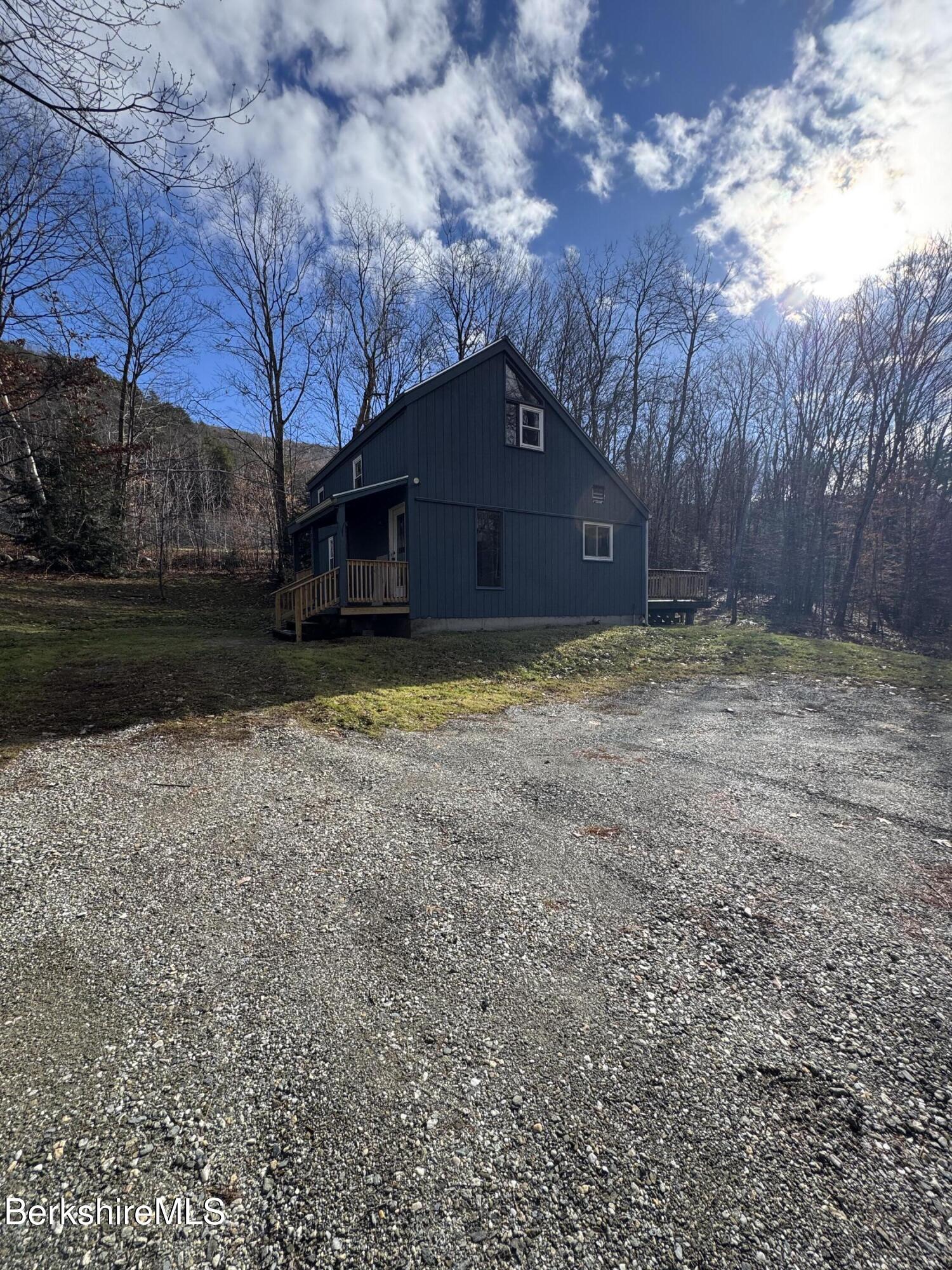 271 Brodie Mountain Road Hancock, MA 01237 - Photo 2 of 27 a house view with backyard space