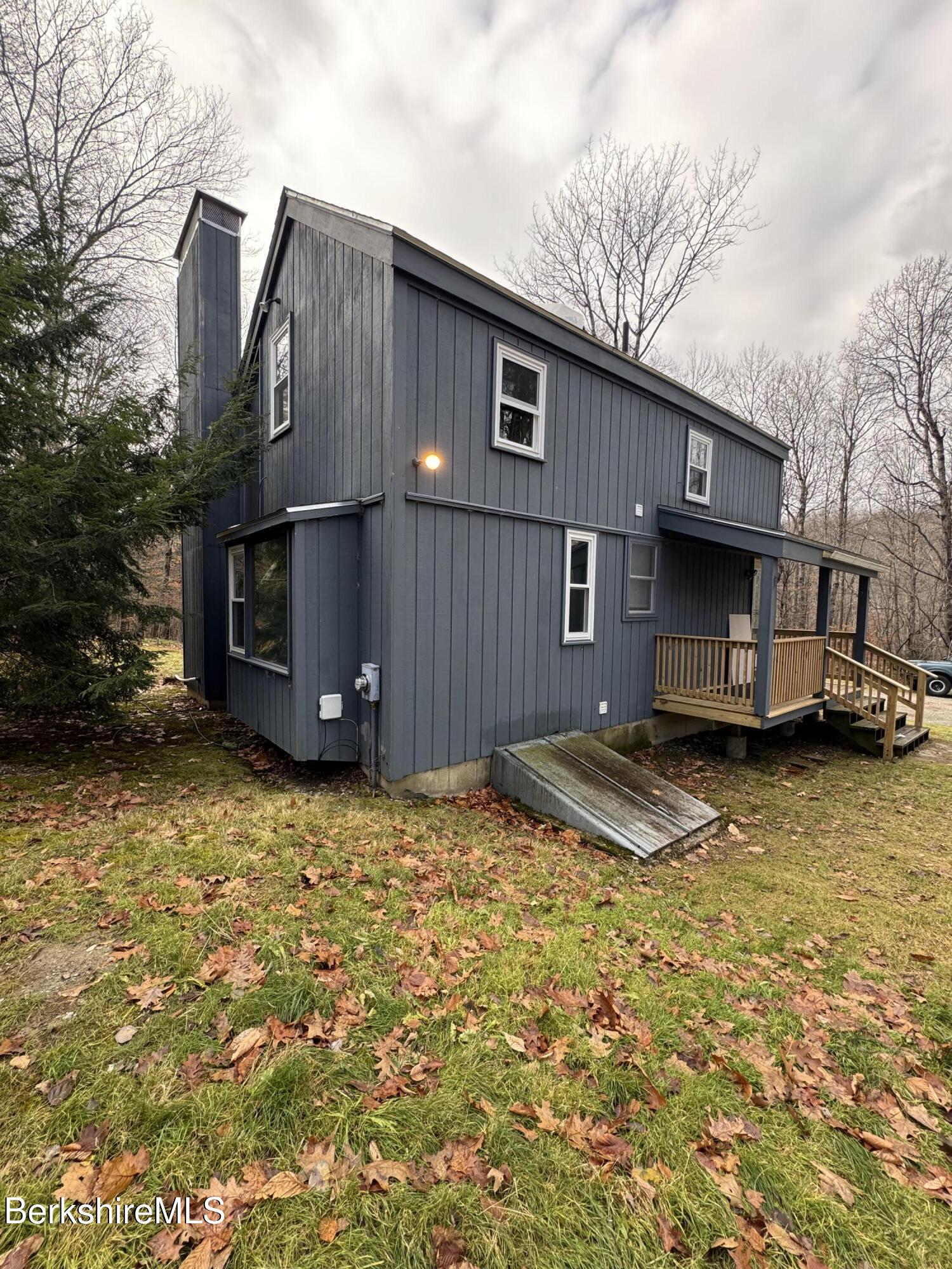 271 Brodie Mountain Road Hancock, MA 01237 - Photo 21 of 27 a view of a house with a yard