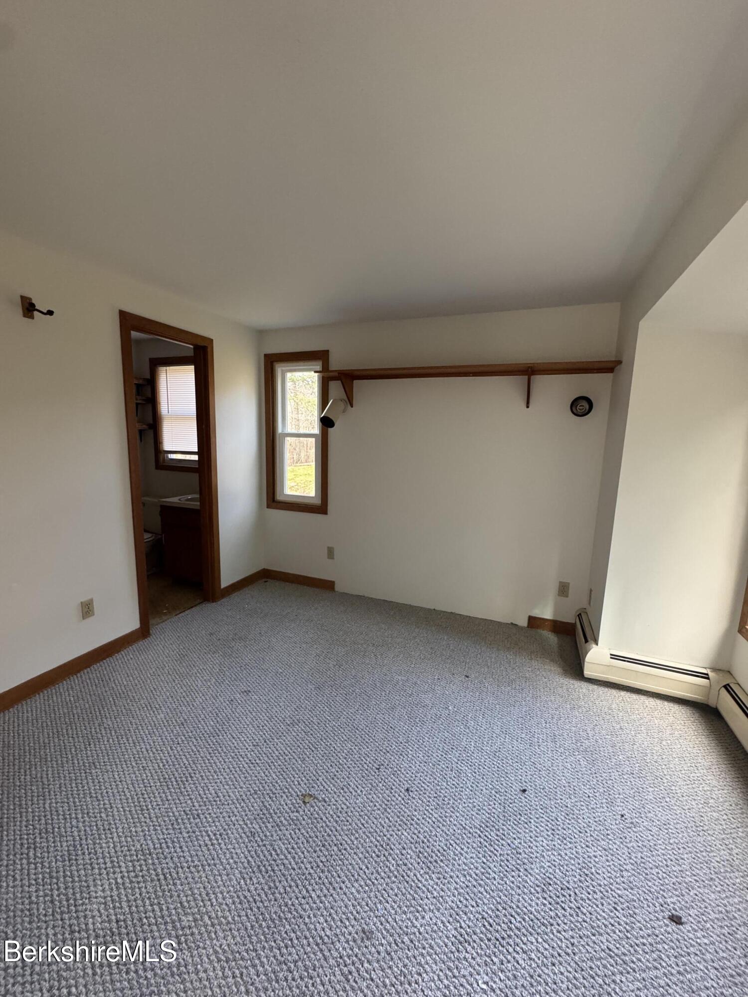 271 Brodie Mountain Road Hancock, MA 01237 - Photo 9 of 27 a view of an empty room with a window