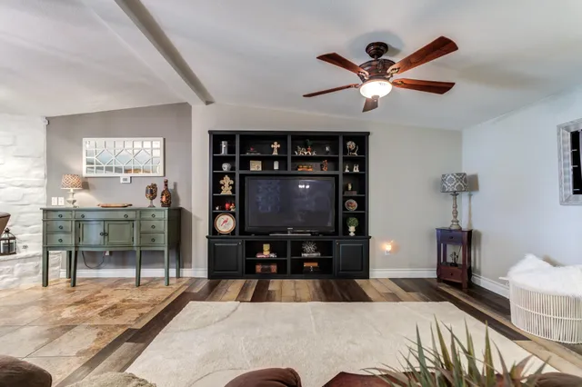 a kitchen with a stove and a sink
