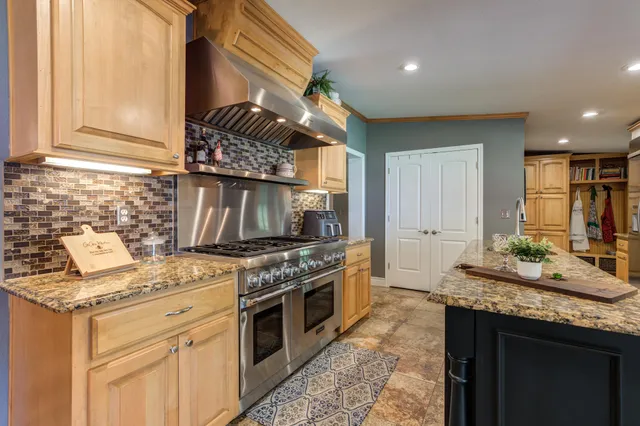 a bathroom with a sink double vanity and a mirror