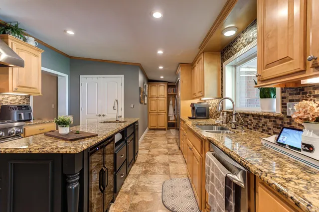 a bed room with a bed and a ceiling fan
